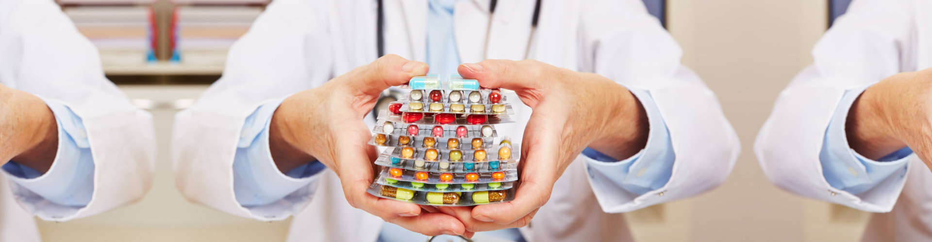 pharmacist holding pills