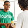 volunteer receiving donation