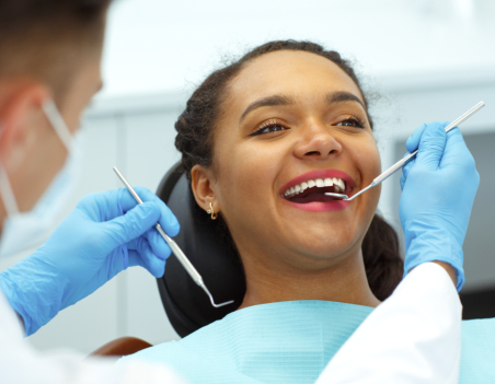 a girl's teeth were examined by the dentist