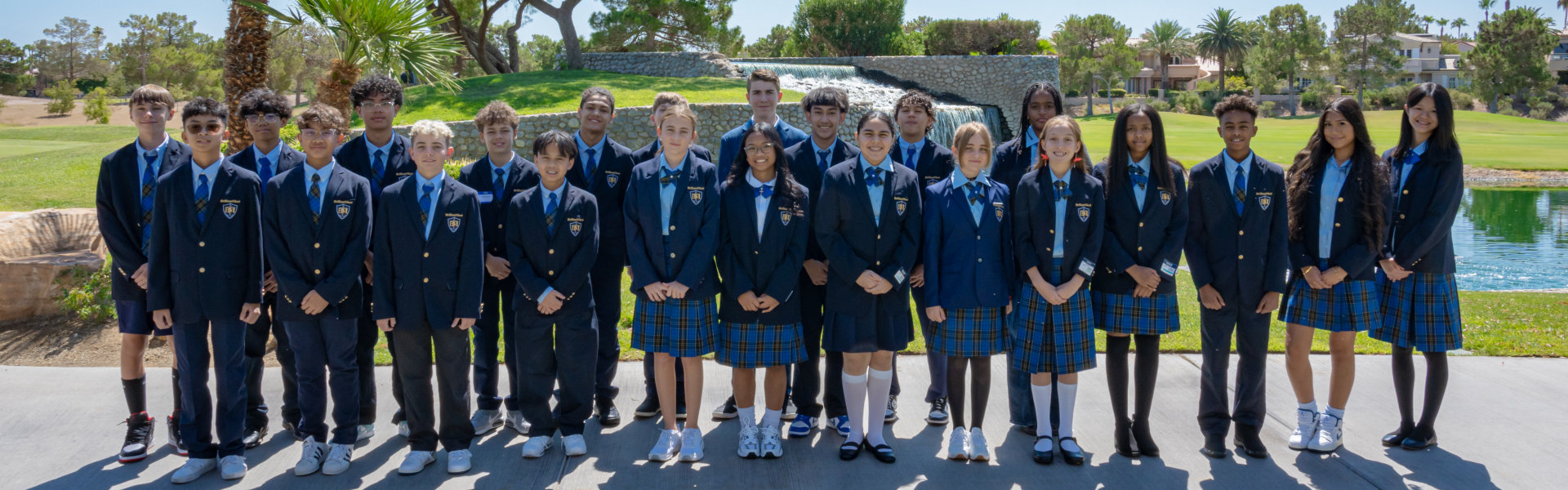 students taking a class photo