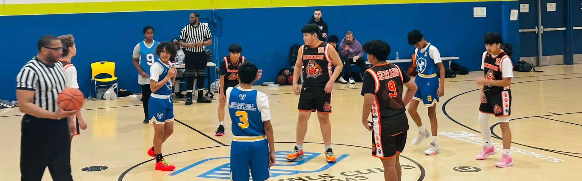 students playing basketball