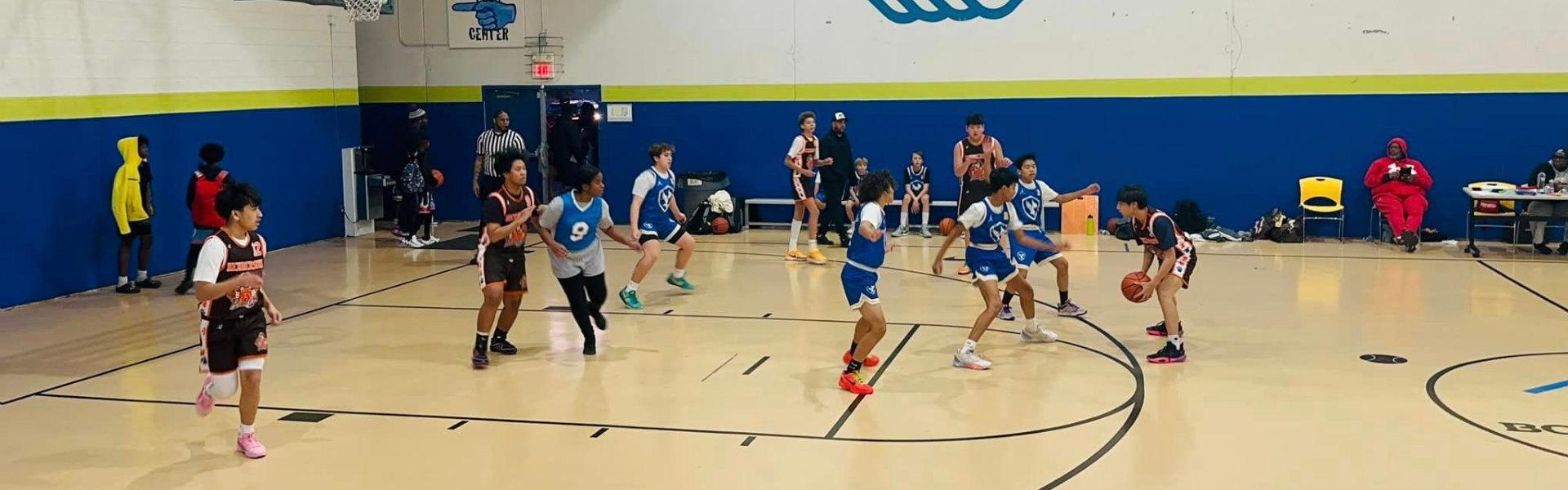 students playing basketball