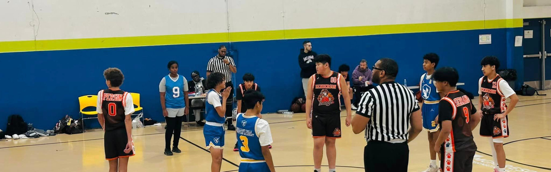 students playing basketball