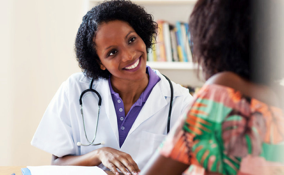 Doctor speaking with a patient
