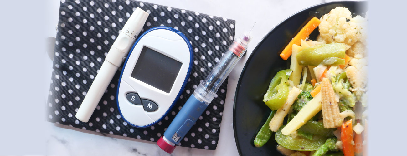 an insulin pen and blood sugar tester