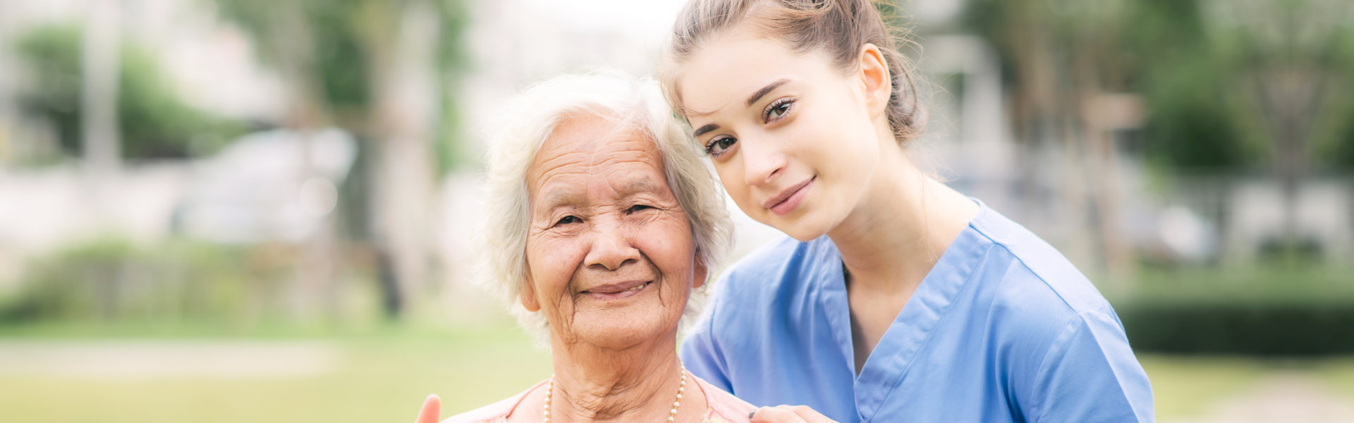 caregiver and senior smiling