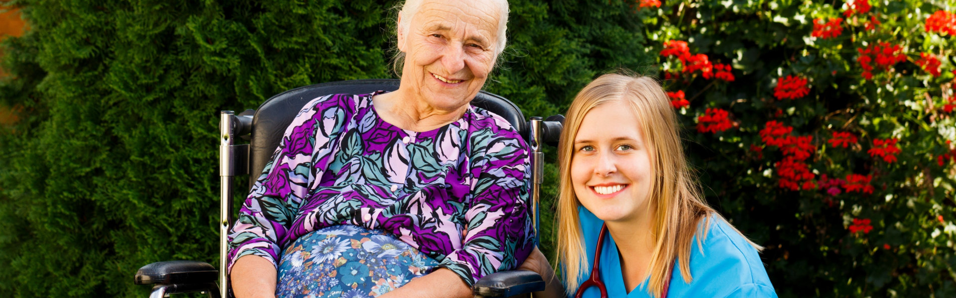 caregiver and senior smiling