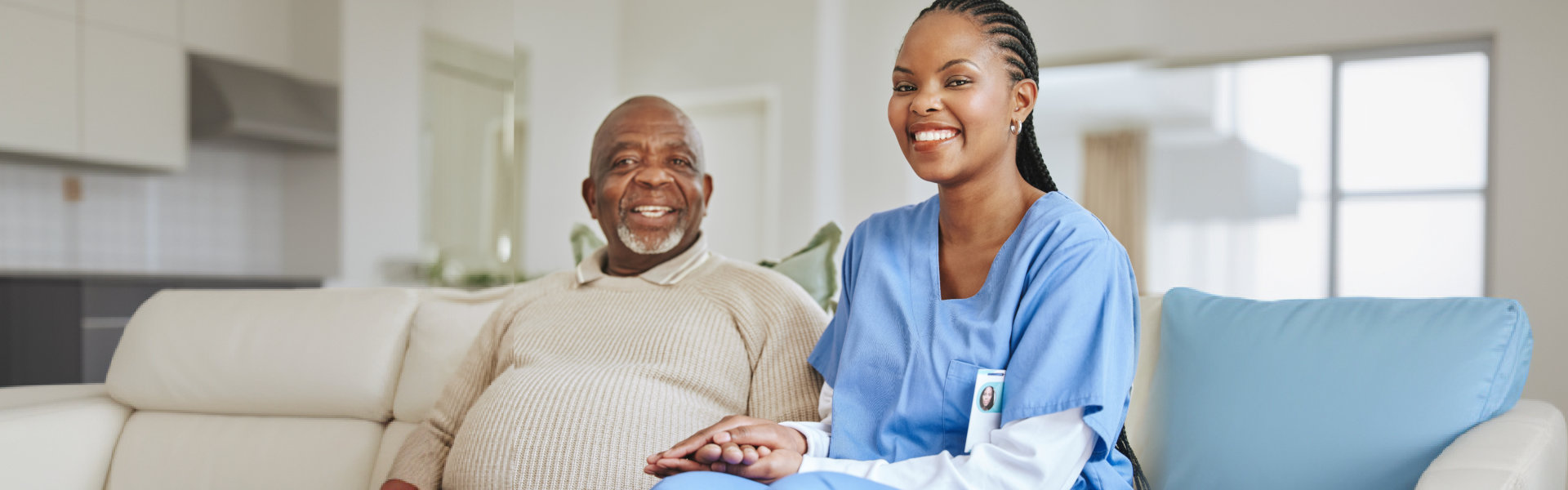 caregiver and senior smiling