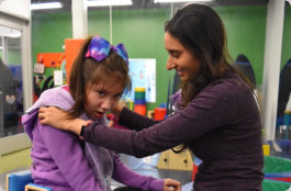 teacher guiding her student