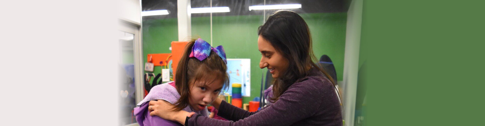 child assisted by the adult woman