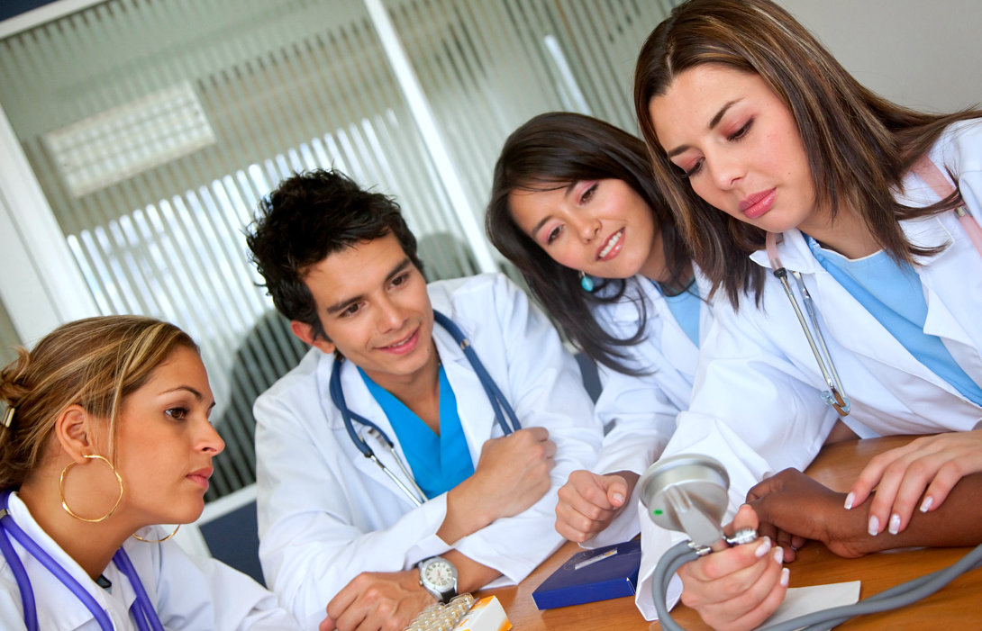 Doctors in a meeting trying the new equipment at the hospital