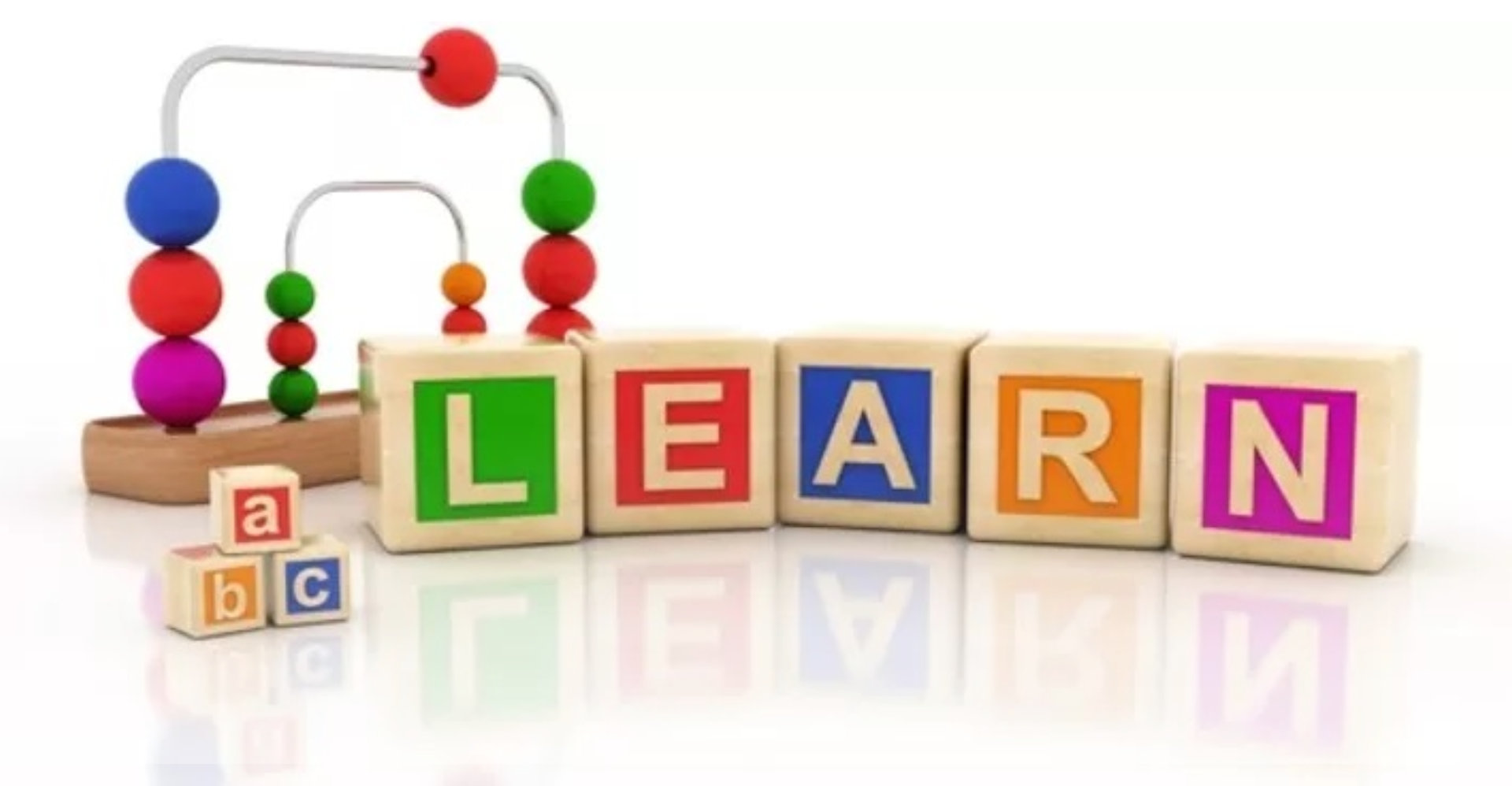alphabet toy cubes making the word learn