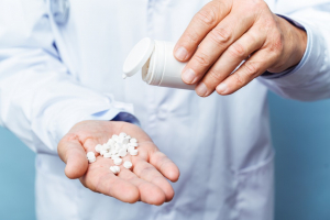 senior patient holding medicine