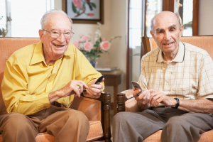 senior patients holding phones
